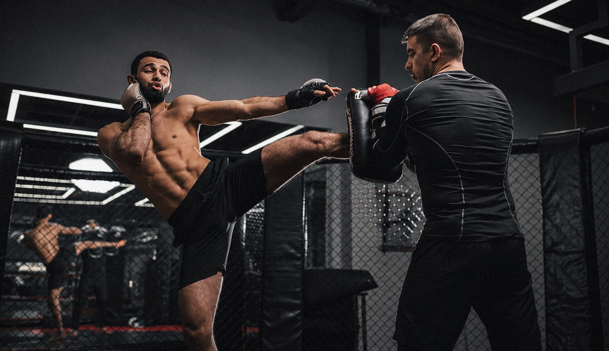 MMA training combining striking, wrestling and BJJ